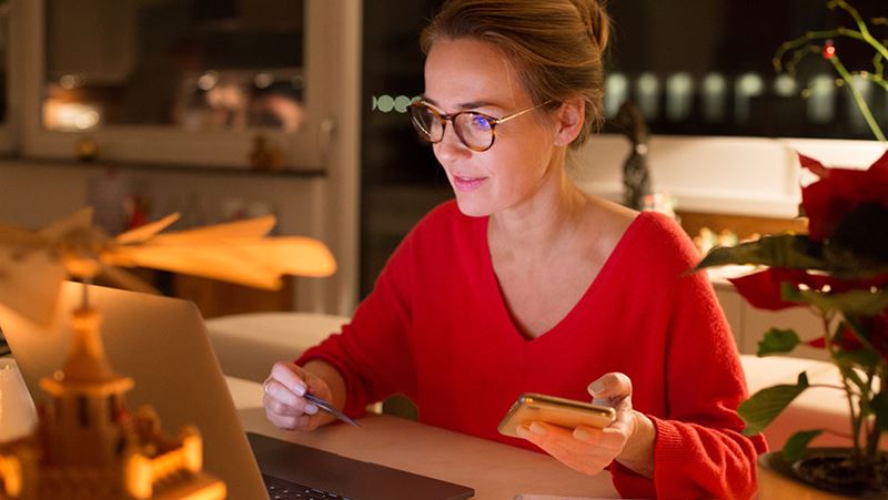 Woman doing holiday shopping online